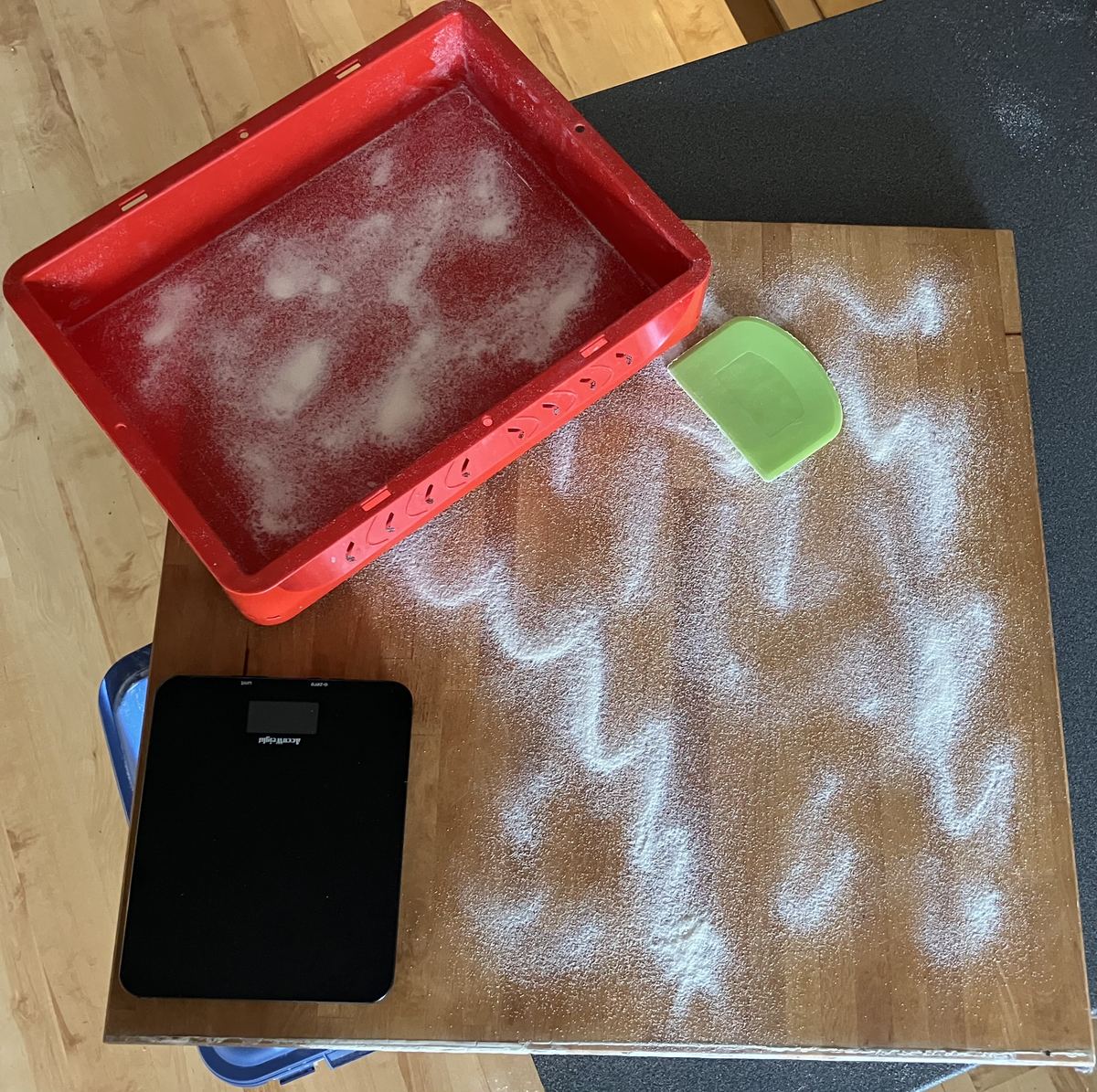 Flour-dusted pizza prep station behind the scenes