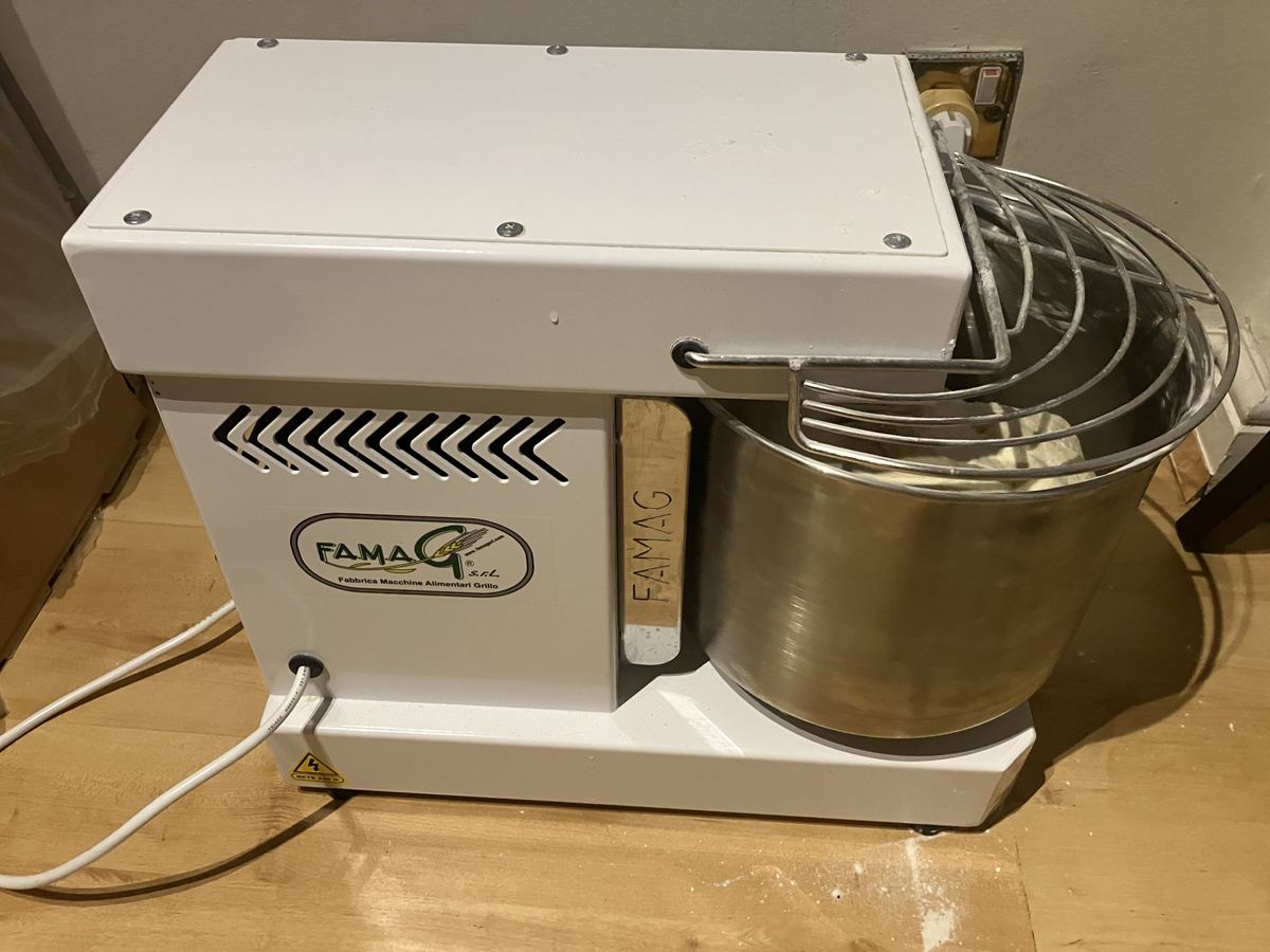 Commercial spiral dough mixer used for pizza dough prep
